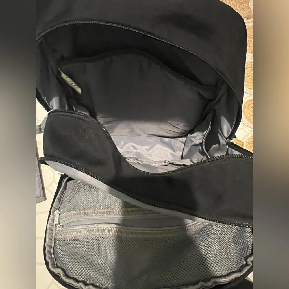 Black Backpack with Tan Details